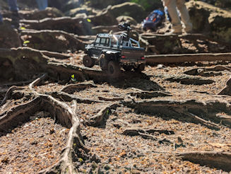 RC Crawler drives over tree roots