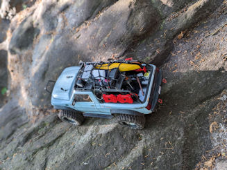 RC Crawler drives over tree roots